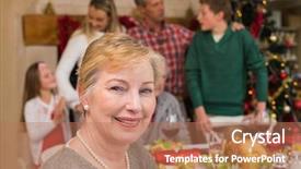 Presentation with living room family - Presentation theme having smiling mature woman posing in front of her family at home in the living room background and a coral colored foreground