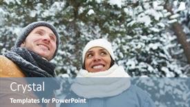  Presentation with ethnic - PPT theme featuring smiling positive young multi-ethnic couple in warm hats and scarf looking around and enjoying beauty of nature while walking in winter park and being on vacation background and a seafoam green colored foreground