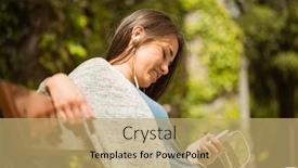  Presentation with text message - PPT theme having smiling student sitting on bench text message on her mobile phone in park at school background and a coral colored foreground