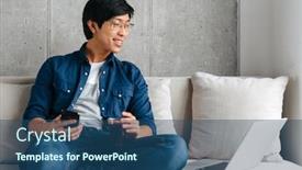  Presentation with man holding phone - Colorful slides enhanced with smiling young asian man sitting on a couch with laptop computer at home holding mobile phone drinking tea backdrop and a ocean colored foreground