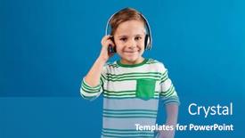  Presentation with blue music - Amazing PPT theme having smiling young boy listening music by headphone and looking at the camera over blue background backdrop and a teal colored foreground
