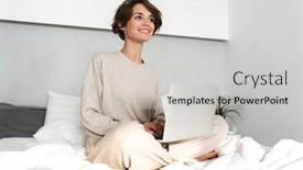  Presentation with relaxing - Presentation having smiling young girl relaxing in bed in the morning using laptop computer background and a light gray colored foreground