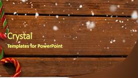  Presentation with candy canes - Theme featuring snow falling against overhead view background and a tawny brown colored foreground