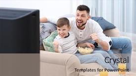  Presentation with football - Slide set featuring soccer table - father and son watching football background and a soft green colored foreground