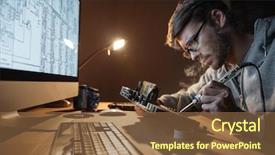  Presentation with motherboard - Slides having solder - focused young man in glasses background and a tawny brown colored foreground