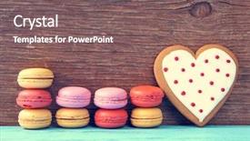  Presentation with cookie - Slide set consisting of some appetizing macarons with different colors and flavors and a homemade heart-shaped cookie on a blue wooden surface against a rustic wooden background background and a gray colored foreground