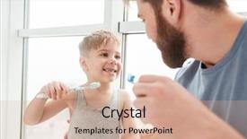  Presentation with father son and looking - Amazing PPT layouts having son smiling while brushing teeth backdrop and a soft green colored foreground
