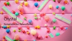  Presentation with colorful - Presentation theme enhanced with colorful chewy candies on wooden background background and a coral colored foreground