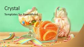  Presentation with glassware - Audience pleasing theme consisting of glassware with different candies on table against color background backdrop and a mint green colored foreground