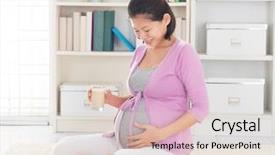  Presentation with pregnant woman - Colorful PPT theme enhanced with only concentration pleasant young man making notes and using laptop while sitting on an armchair backdrop and a gray colored foreground.