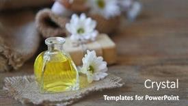  Presentation with spa concept - Beautiful PPT theme featuring spa concept aroma oil and daisy flowers on wooden table backdrop and a gray colored foreground