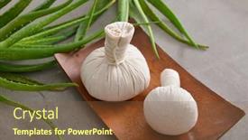  Presentation with herbal - Amazing PPT theme having spa setting with green aloe with herbal ball in wooden bowl on gray background backdrop and a tawny brown colored foreground