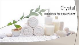  Presentation with spa stones leaves - Beautiful slide deck featuring spa setting with green leaves on rolled towel bottle oil herbal ball salt in bowl candle pile of white stones backdrop and a white colored foreground