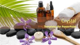  Presentation with palm oil - Colorful presentation theme enhanced with spa still life with orchid and black stones towel oil candle palm backdrop and a tawny brown colored foreground