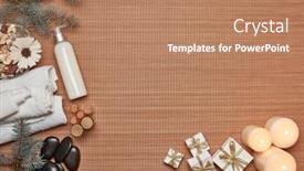  Presentation with body care spa body massage - Presentation featuring spa still life with toiletry candles gift boxes massage stones and fir branch on bamboo mat background top view with copy space healthy lifestyle body care spa treatment new year and christmas background and a coral colored foreground