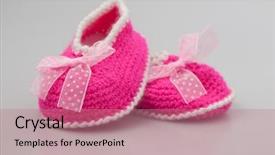  Presentation with baby shoes - Slide set consisting of space knitted baby booties crochet background and a coral colored foreground