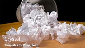  Presentation with waste - Beautiful PPT theme featuring spilled office trash can or waste basket on a wood floor on black background focus is on the center of the waste basket backdrop and a coral colored foreground