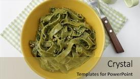  Presentation with pasta sauce - Amazing PPT theme having spinach fettuccine pasta with pesto sauce in a yellow bowl backdrop and a gold colored foreground