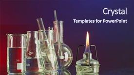  Presentation with blue flame - Amazing PPT theme having spiritlamp and test-tubes backdrop and a navy blue colored foreground