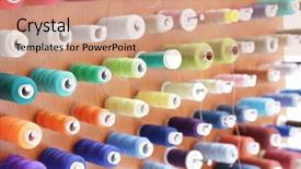 Presentation with thread - Beautiful presentation theme featuring spools with threads on rack backdrop and a coral colored foreground
