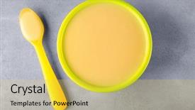  Presentation with spoon - Amazing presentation design having bowl and spoon with baby porridge on table backdrop and a yellow colored foreground