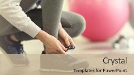  Presentation with woman sport - PPT theme featuring sport female - woman tying shoelaces of sneaker background and a soft green colored foreground