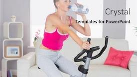  Presentation with exercise bike - Presentation theme enhanced with sporty determined blonde training on exercise bike drinking water in bright living room background and a light gray colored foreground