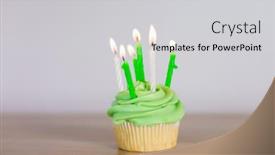  Presentation with birthday celebration - Cool new slides with st patricks day birthday holidays and celebration concept - green cupcake with six burning candles on table backdrop and a light gray colored foreground
