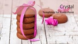  Presentation with pink ribbon - Beautiful slide deck featuring stack of chocolate cookies tied backdrop and a coral colored foreground