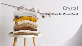  Presentation with garments - PPT theme featuring stack-of-folded-casual-garments background and a white colored foreground