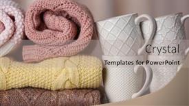  Presentation with knitted clothes - Audience pleasing slide deck consisting of stack of knitted clothes and cups on wooden table indoors backdrop and a light gray colored foreground