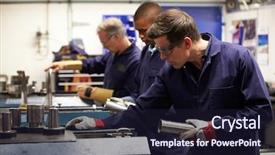  Presentation with engineering - PPT layouts enhanced with staff manual - busy interior of engineering workshop background and a wine colored foreground