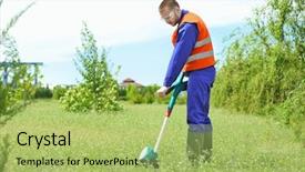  Presentation with outdoor worker safety - Amazing PPT theme having staff manual - young worker mowing lawn backdrop and a yellow colored foreground