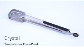  Presentation with stainless steel - Slide deck having stainless-steel-ice-tongs-isolated background and a  colored foreground