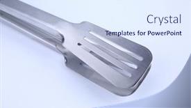  Presentation with stainless steel - Presentation with stainless-steel-ice-tongs-isolated background and a  colored foreground