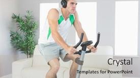  Presentation with exercise bike - Slide set consisting of stern handsome man training on exercise bike listening to music in bright living room background and a mint green colored foreground