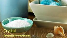  Presentation with crystals - PPT theme featuring still life of two bowls of bath crystals candle and seashells on a bamboo mat background and a tawny brown colored foreground