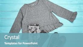  Presentation with clothes - Audience pleasing PPT theme consisting of fabric stock - set of child's clothes backdrop and a teal colored foreground