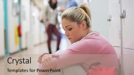  Presentation with sad lonely student sitting - Slide deck having student sitting on the floor background and a mint green colored foreground