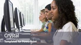  Presentation with of a computer lab - Beautiful presentation theme featuring students in a computer lab backdrop and a gray colored foreground