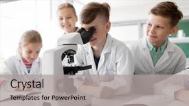  Presentation with children education - Audience pleasing slides consisting of students with microscope studying biology backdrop and a light gray colored foreground