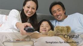  Presentation with family as institution - Colorful PPT theme enhanced with stuffed animals - family watching tv together backdrop and a coral colored foreground