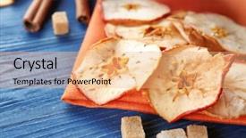  Presentation with empty of wood table top - Audience pleasing theme consisting of sugar aplle - tasty apple chips on wooden backdrop and a coral colored foreground