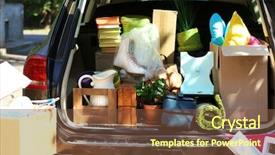  Presentation with moving and drving car - Slides with suitcases in trunk of car background and a tawny brown colored foreground
