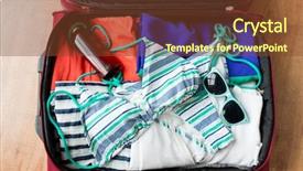  Presentation with beach bag - Theme enhanced with summer vacation travel tourism and objects concept - close up of travel bag with beach clothes sunglasses and sunscreen background and a tawny brown colored foreground