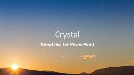  Presentation with orange colored - Amazing presentation theme having sun behind dark mountain silhouettes with blue and orange colored sky backdrop and a seafoam green colored foreground