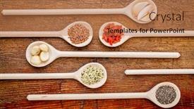  Presentation with macadamia nuts - Presentation theme featuring superfood abstract garlic cloves goji berry chia hemp flax seeds macadamia nuts - top view of wooden spoons against rustic grunge wood background and a coral colored foreground