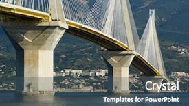  Presentation with crossing bridge - PPT theme consisting of suspension bridge crossing corinth gulf background and a ocean colored foreground