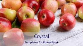  Presentation with sweet - Theme enhanced with sweet apples on wooden background background and a sky blue colored foreground