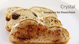  Presentation with fruit jam - Presentation design consisting of sweet jam on a slice of homemade christmas stollen cake with raisins nuts spices and chopped dried fruit background and a lemonade colored foreground